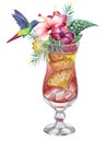 Strawberry and pineapple cocktail with ice in a glass wine glass with a bright tropical bouquet and a hummingbird bird Royalty Free Stock Photo